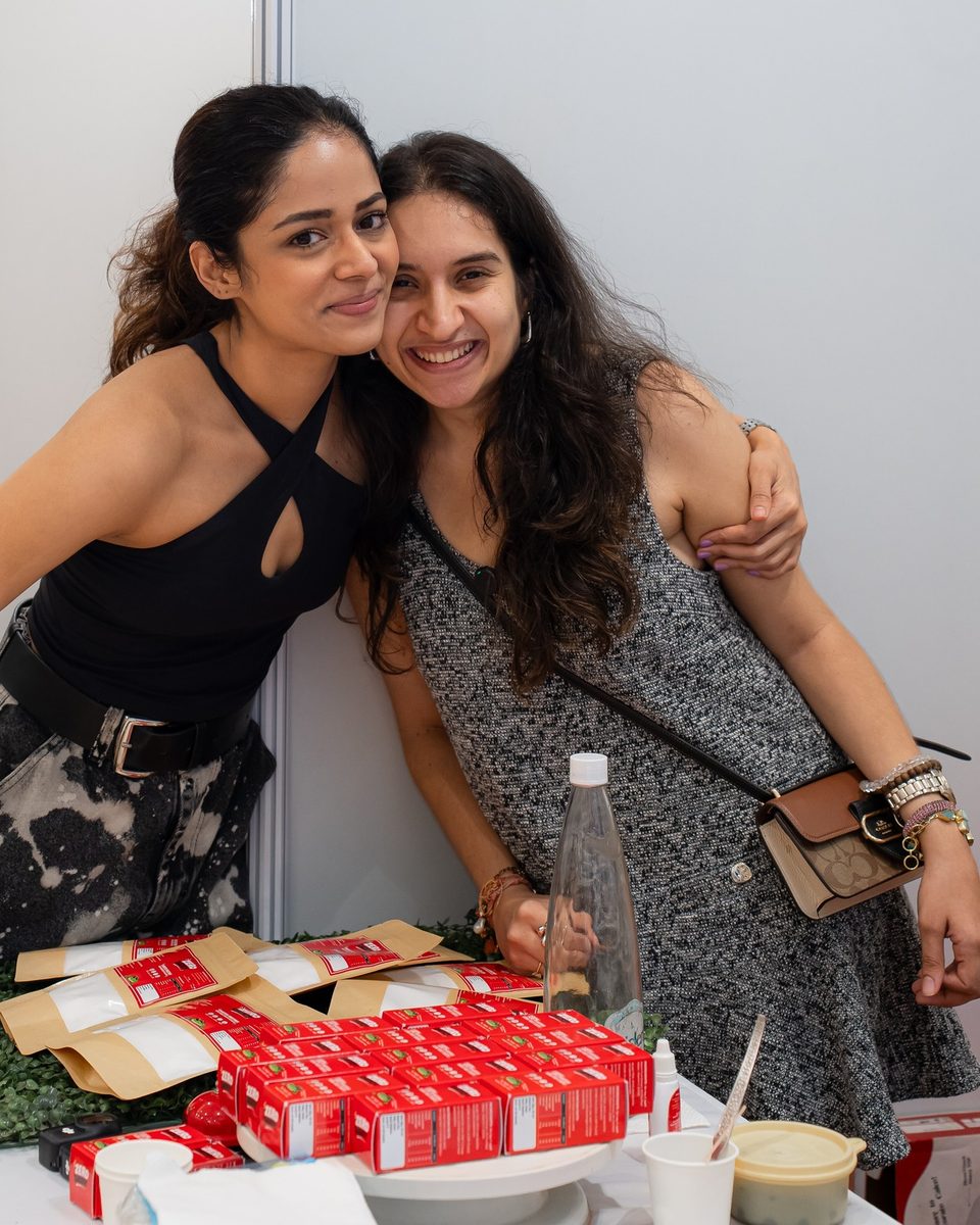 Ashika and Tanvi behind the Zerodaddy stall